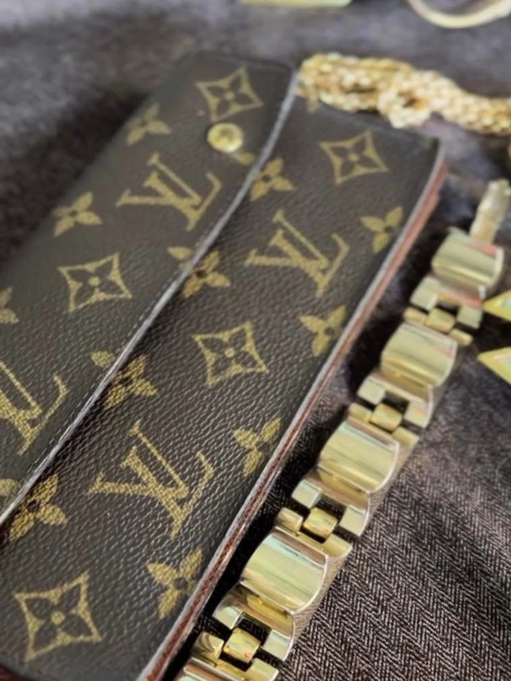 Louis Vuitton Monogram Canvas Accordion Clutch in Brown with Gold Accents